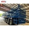 Feichi 4 Axles Heavy Transport Cargo High Side Fence Semi Trailer Fence Flatbed Truck Trailer Fence Cargo Semi Truck Trailer